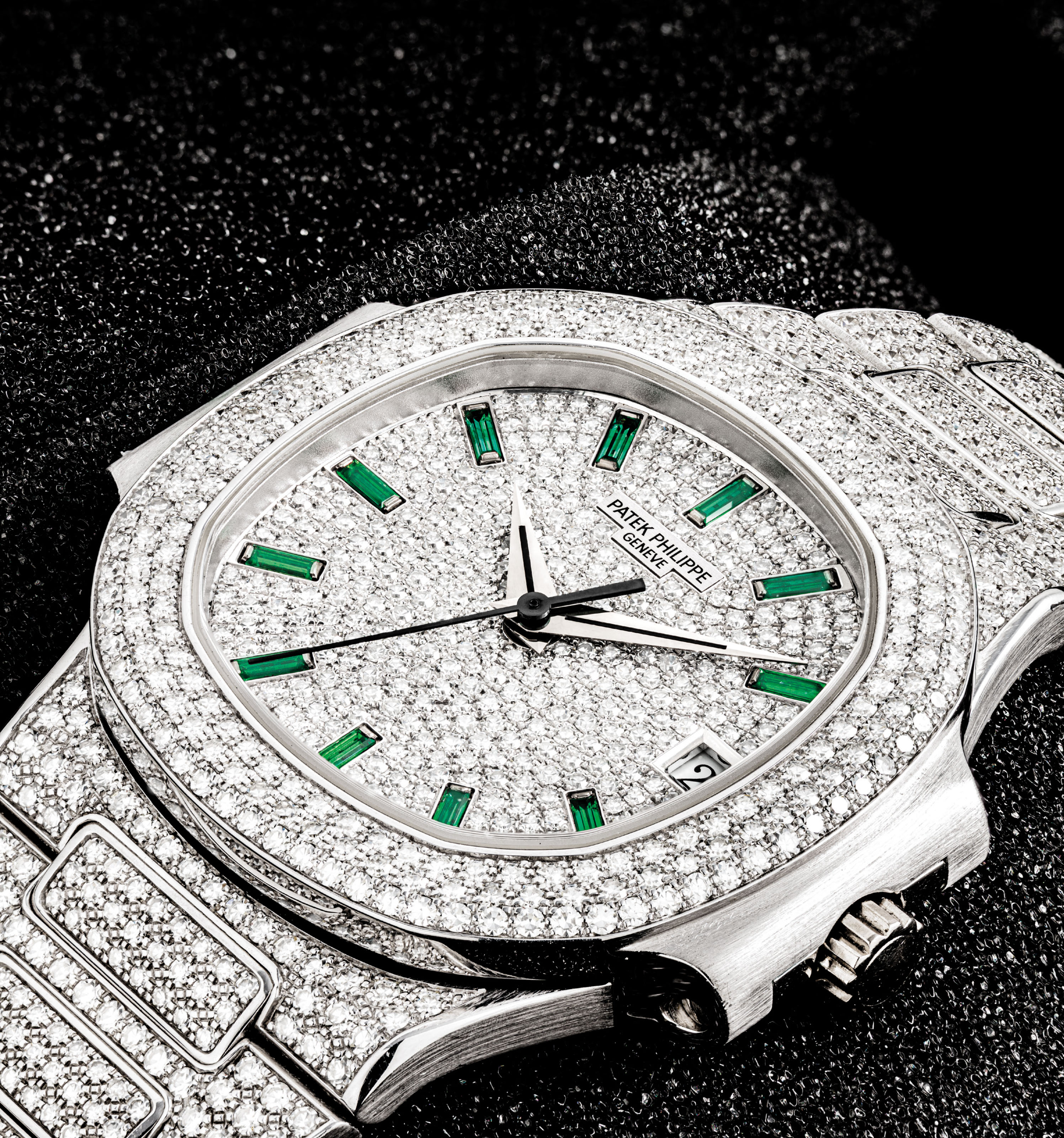 Patek Philippe A Very Rare And Exceptional 18k White Gold Diamond And Emerald Set Automatic Wristwatch With Sweep Centre Seconds Date And Bracelet Signed Patek Philippe Geneve Nautilus Model Ref 3800 108 Movement